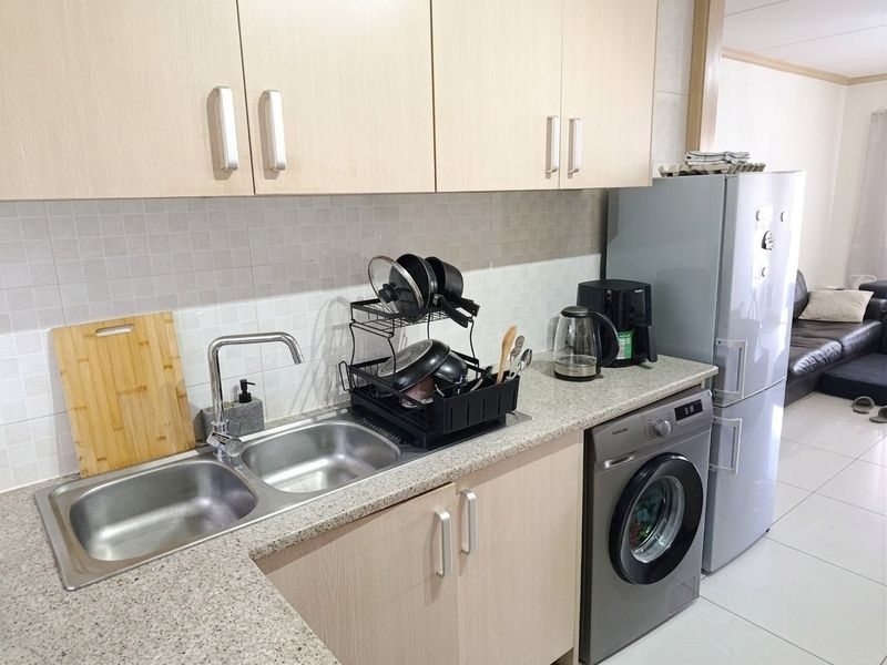 Live on top of the world in this 2 bed 1 bath apartment in highly sought after Phoenix Regent I - Photo 1