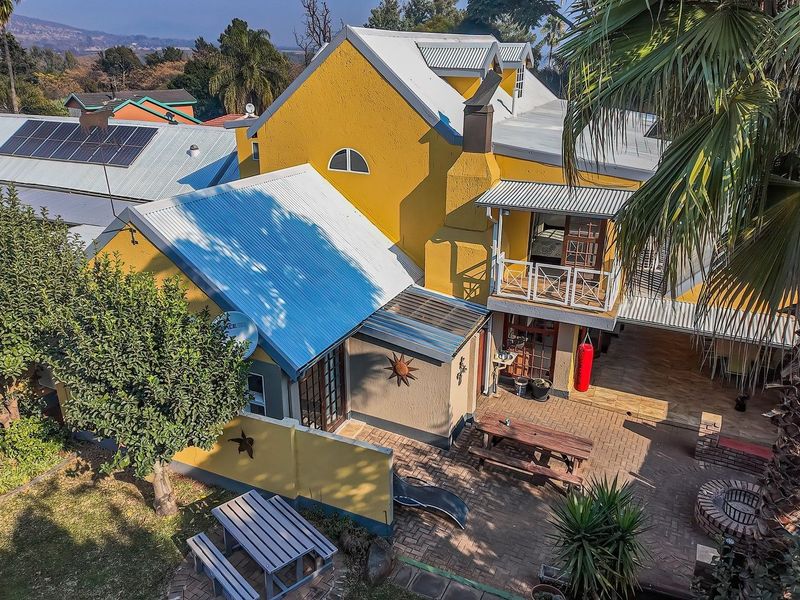 Spacious Family Home with Charming Income-Generating Cottages - Photo 1