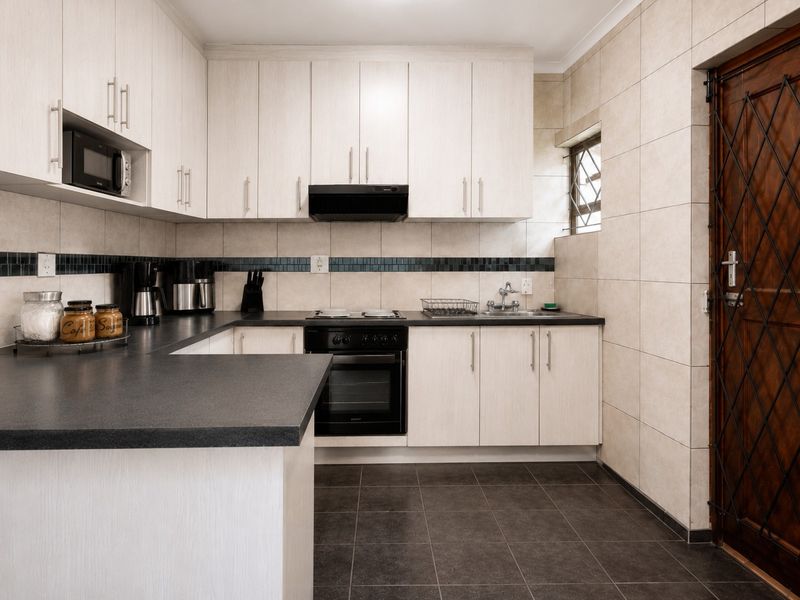 Well-Maintained Three-Bedroom Home Offering Comfort, Security and Easy Living: For Sale - Photo 9