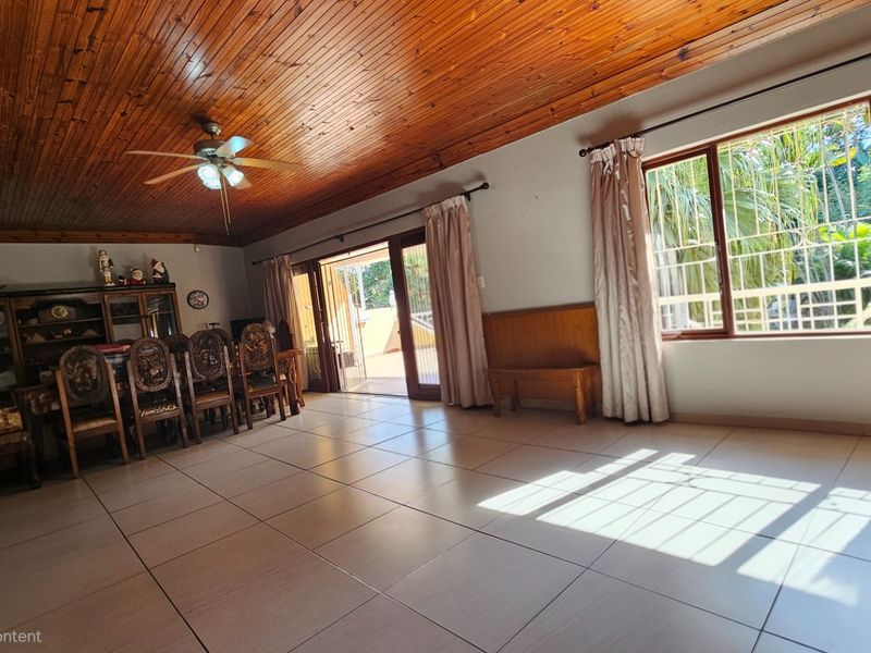 Generous Uvongo Family Home with Solar Backup and Large Garden - Photo 6