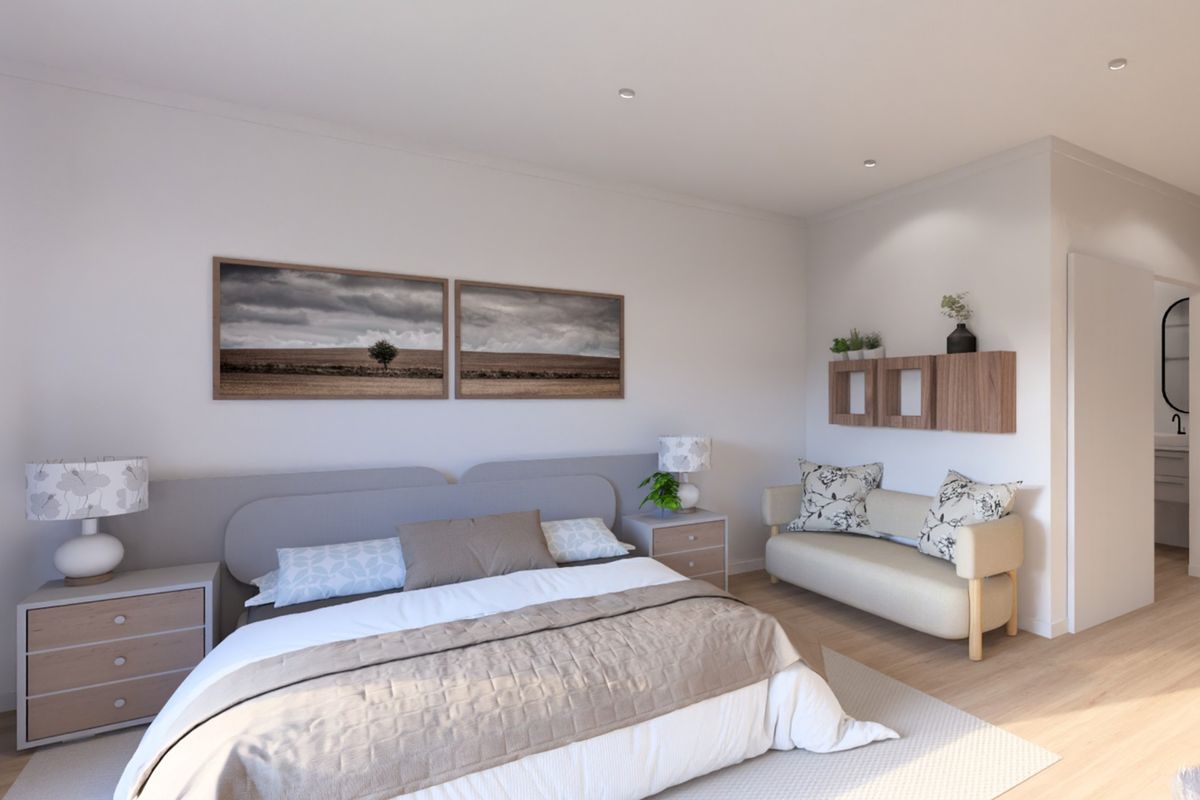 A well-lit, modern bedroom featuring neutral tones, recessed downlighting, and light wood-look flooring, offering a comfortable and contemporary living space.