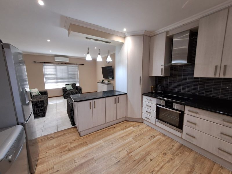 Entertain in Style! 3 Bedroom Townhouse with Braai Room and Pool - Photo 1