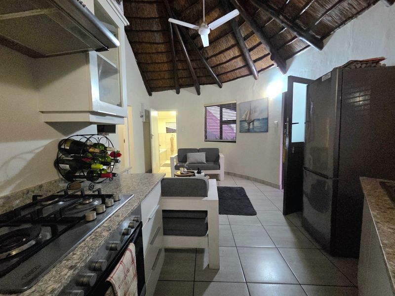 Convenient Beachside Getaway - Photo 9