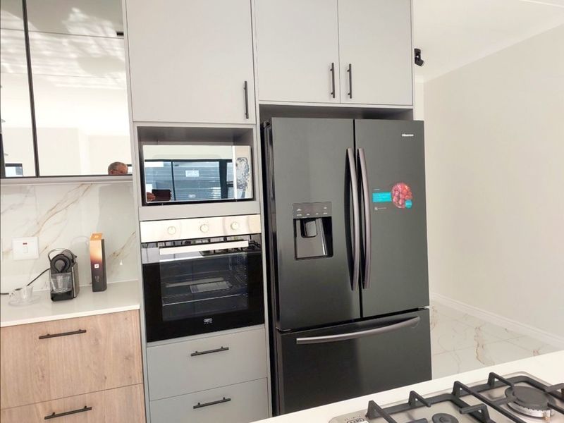 This is new-build luxury at an exceptional price point. Modern Luxury Living in the Heart of Sandown - Photo 3