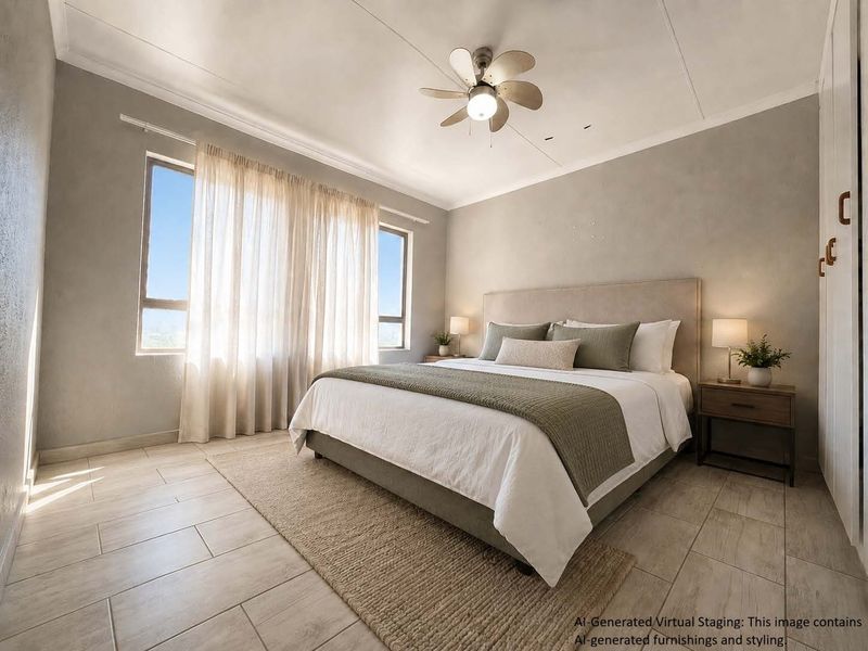 A well-lit bedroom featuring tiled flooring, a ceiling fan, and built-in cupboards, presented with virtual staging to showcase the space's potential.