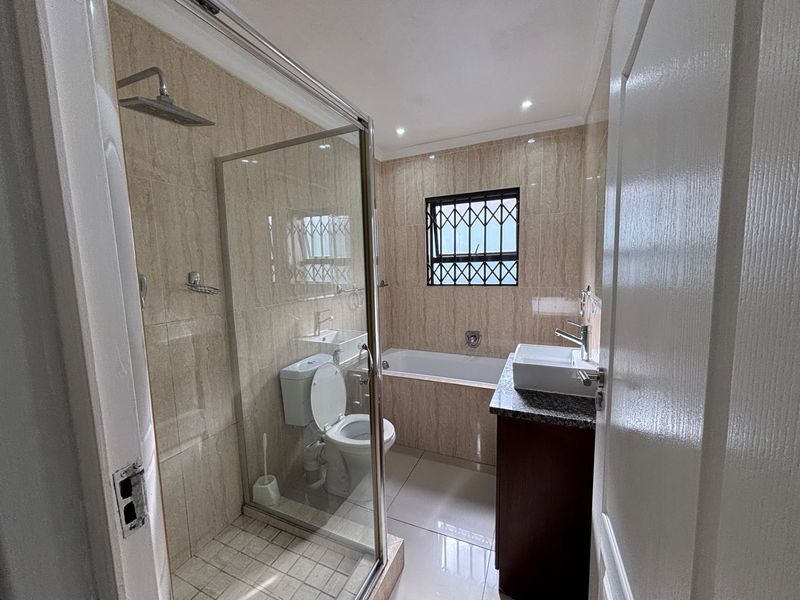 Modern 4-Bedroom Double-Storey Family Home with Double Garage | R28,000 per Month - Photo 10
