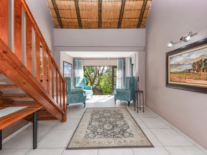 Leafy Sanctuary with Seamless Indoor-Outdoor Living - Photo 7
