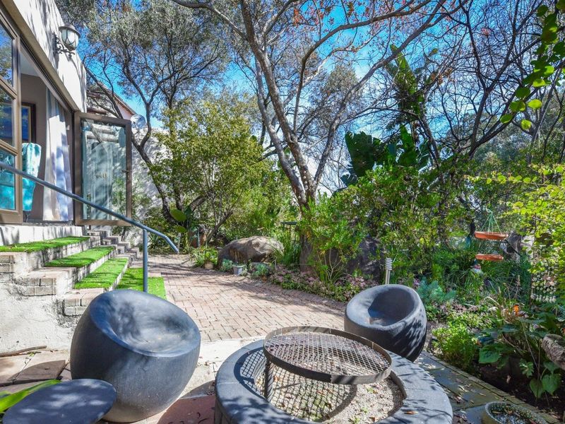 Leafy Sanctuary with Seamless Indoor-Outdoor Living - Photo 4