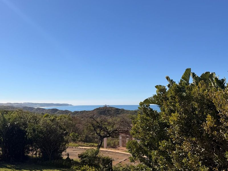 A scenic elevated view overlooking the surrounding coastal landscape and ocean horizon.