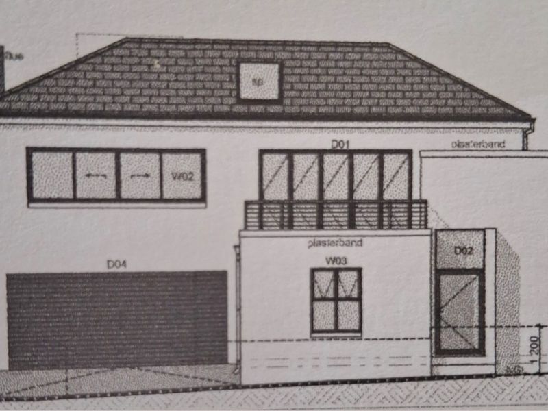 Architectural elevation drawing showing the front facade of the house, including garage, balcony, and window placements.