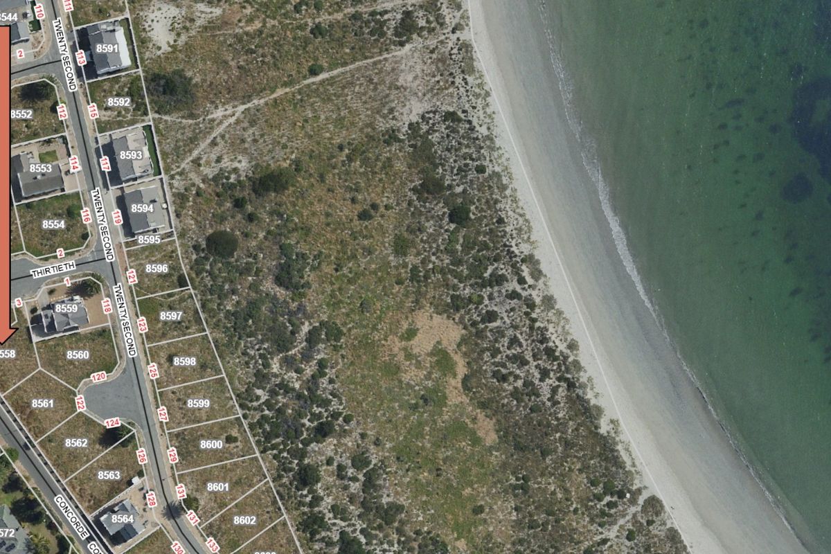 Aerial satellite view showing the property location and surrounding coastal landscape.