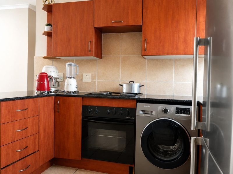 Neat 2 Bedroom Top Floor Apartment with Patio | Family-Friendly Complex | Brakpan - Photo 3