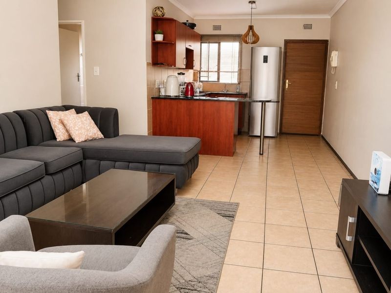 Neat 2 Bedroom Top Floor Apartment with Patio | Family-Friendly Complex | Brakpan - Photo 5