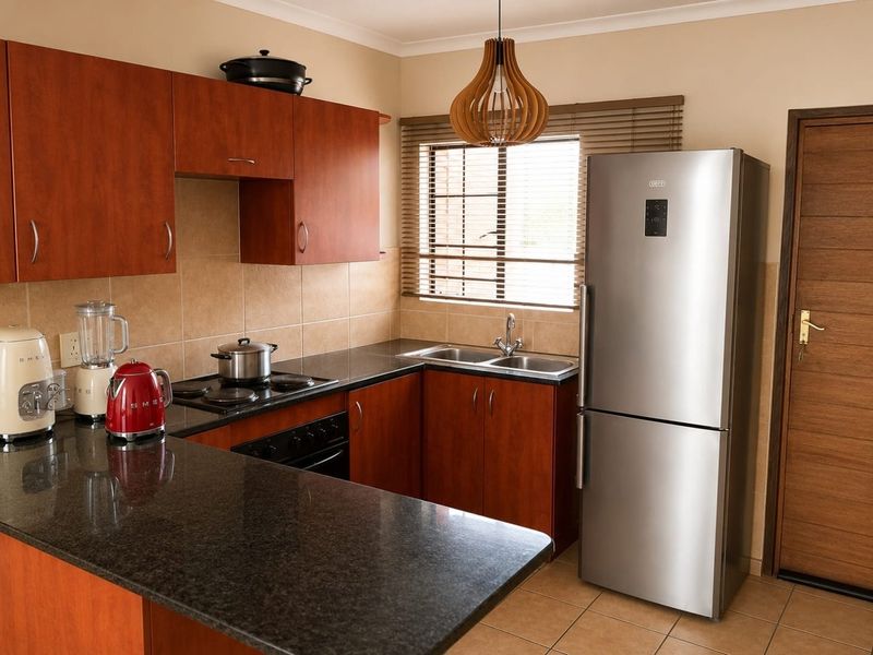 Neat 2 Bedroom Top Floor Apartment with Patio | Family-Friendly Complex | Brakpan - Photo 2