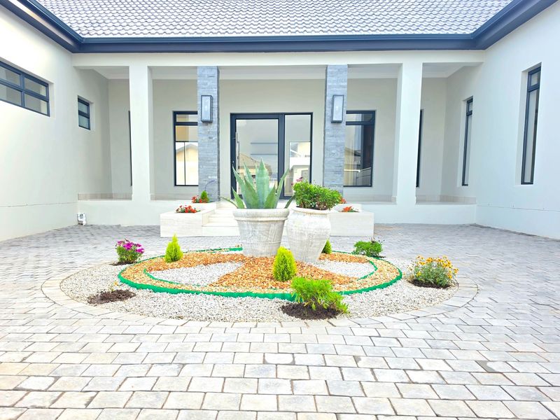 Exclusive Brand-New Luxury 4-Bedroom Home in Fountains Estate | Jeffrreys Bay - Photo 2