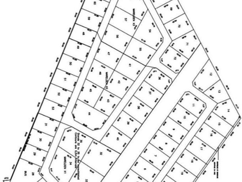 A detailed site layout plan showing the subdivision of agricultural land, including individual stand boundaries and designated servitude areas.