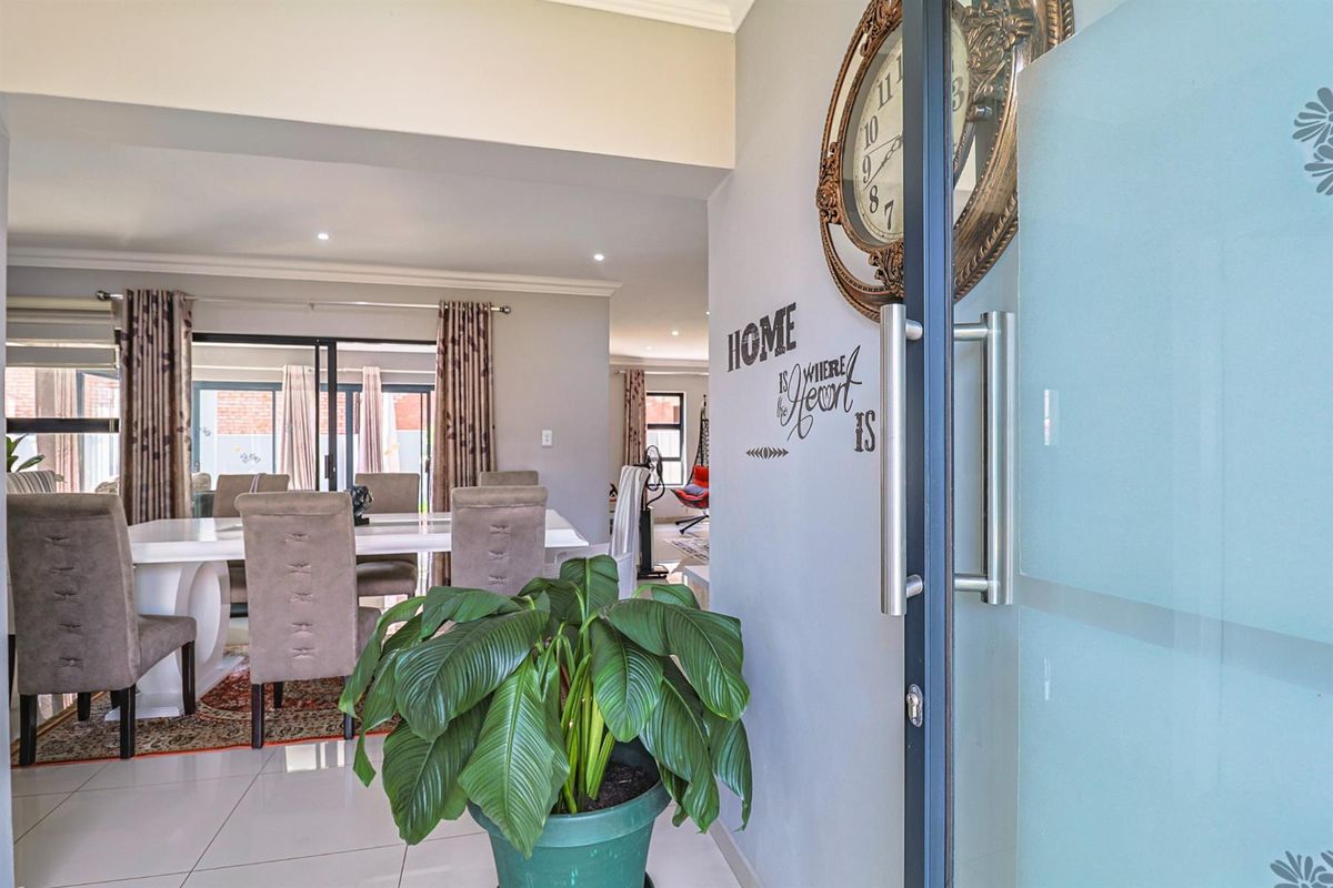 Ultra Modern Family Haven with Solar Power, Pool and Exceptional Style in Hartbeespoort - Photo 3