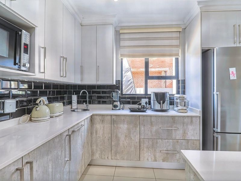 Ultra Modern Family Haven with Solar Power, Pool and Exceptional Style in Hartbeespoort - Photo 10