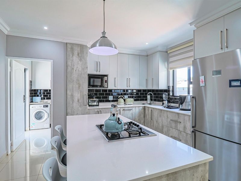 Ultra Modern Family Haven with Solar Power, Pool and Exceptional Style in Hartbeespoort - Photo 8