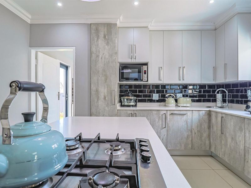 Ultra Modern Family Haven with Solar Power, Pool and Exceptional Style in Hartbeespoort - Photo 9