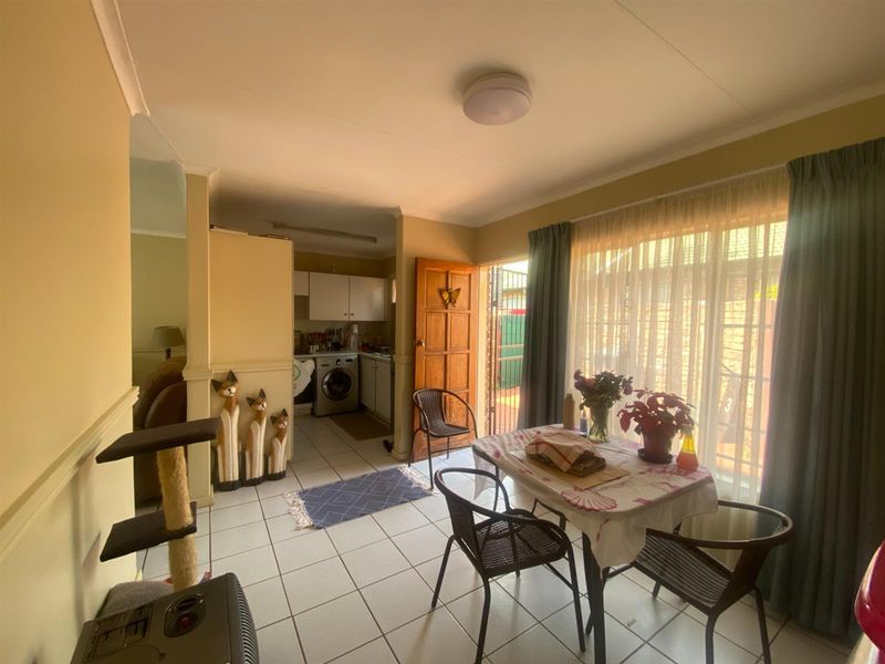 Neat Townhouse in a Secure Complex Next to Bishops Bird Park - Photo 3