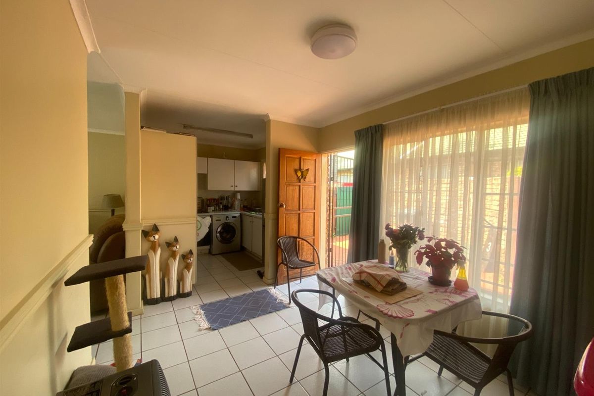 Neat Townhouse in a Secure Complex Next to Bishops Bird Park - Photo 3