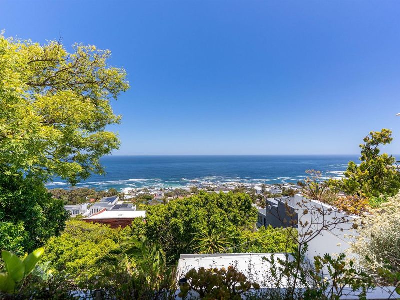A serene coastal sanctuary perched in one of Camps Bay’s most exclusive elevated positions. - Photo 8