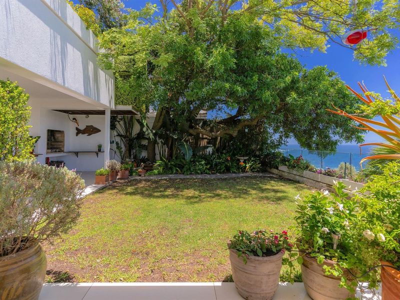 A serene coastal sanctuary perched in one of Camps Bay’s most exclusive elevated positions. - Photo 6