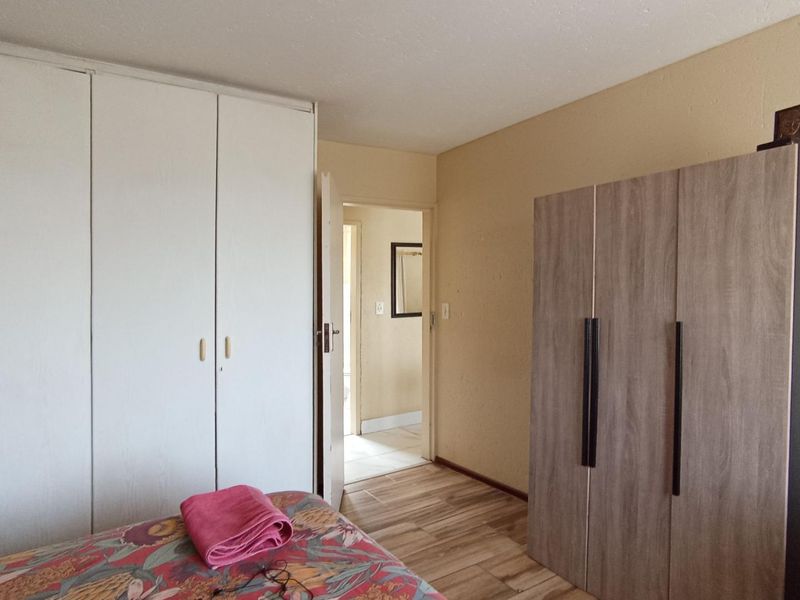 Secure, Well-Positioned Two-Bedroom Apartment with Lifestyle Appeal - Photo 8