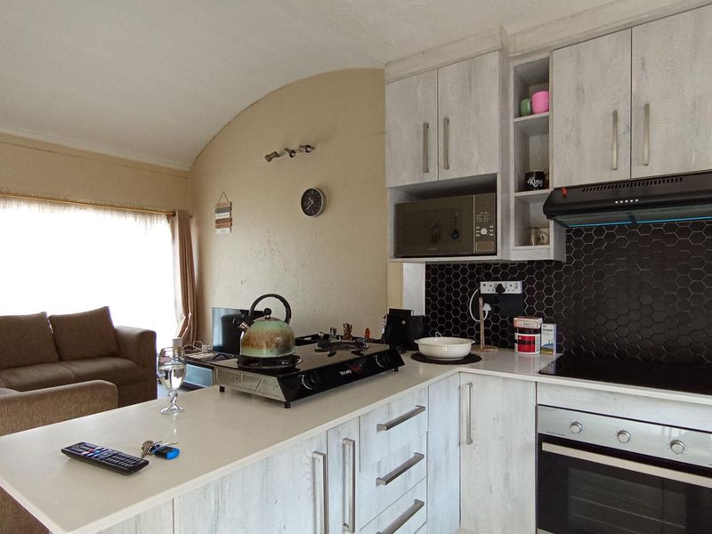 Secure, Well-Positioned Two-Bedroom Apartment with Lifestyle Appeal - Photo 6