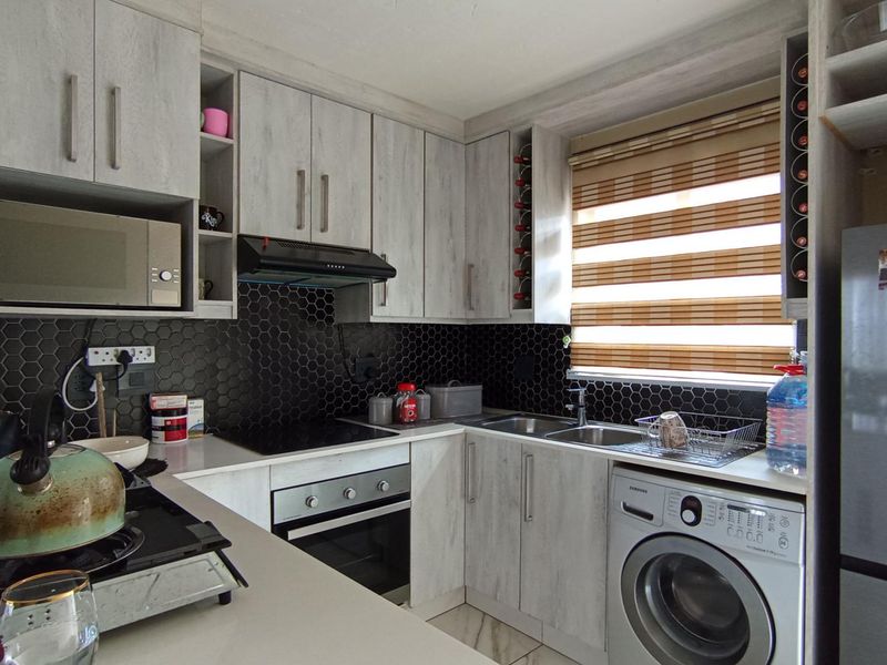 Secure, Well-Positioned Two-Bedroom Apartment with Lifestyle Appeal - Photo 5