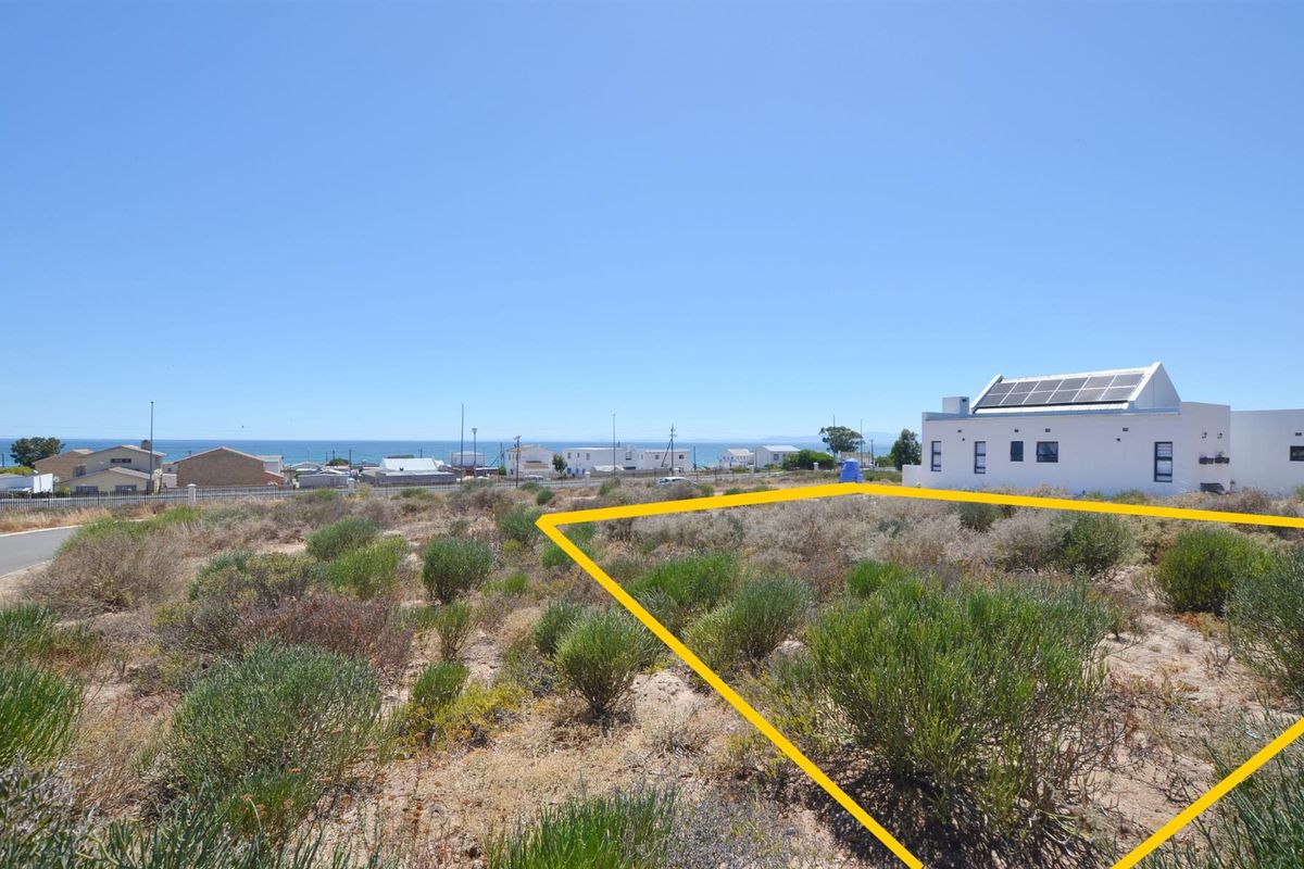 Prime Vacant Land with Design Flexibility in Secure Coastal Village - Photo 2