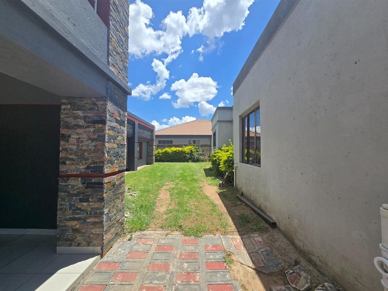 Guest House or Extended Family Home with Dual-Living Layout - Photo 2