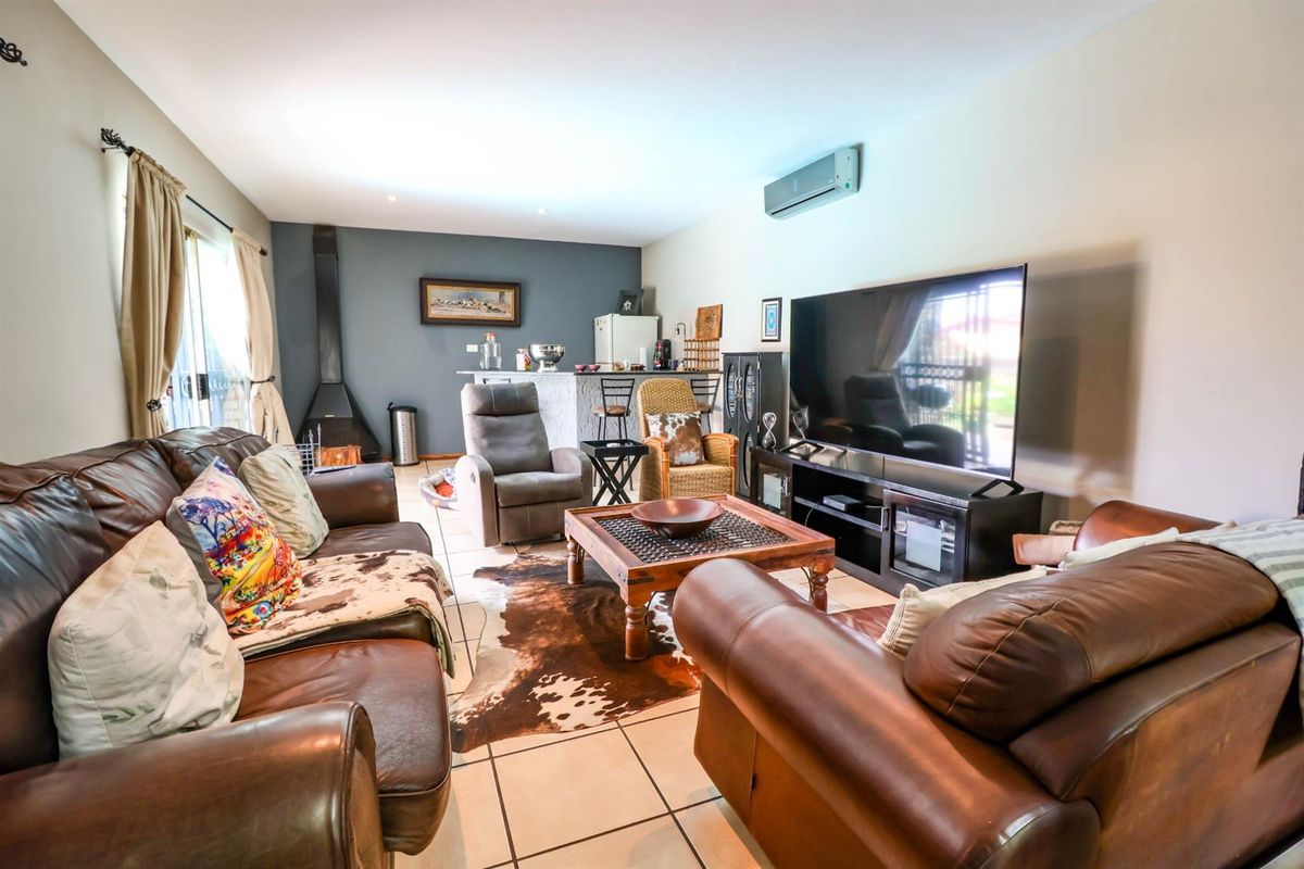 4 Bedroom home  with Flatlet and Solar System in Boomed Area - Photo 3