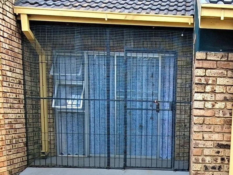 A hidden two-bedroom gem, tucked away in the far corner of a beautiful complex - Photo 2