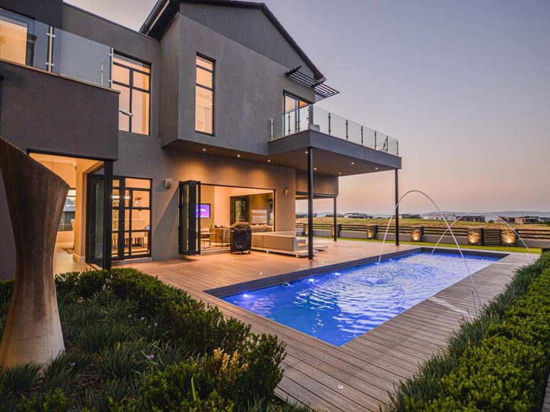 Refined Fairway Masterpiece | Lock-Up-and-Go Luxury at   Copperleaf Golf and Country Estate - Photo 4