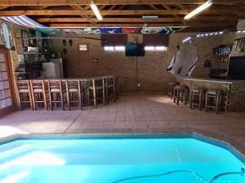 Prestigious 4-Bedroom Home with Exceptional Entertainment - Secunda - Photo 3