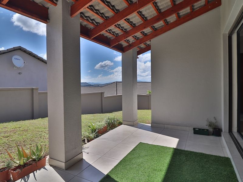Elegant 3-Bedroom Home with Stunning Views in Secure Intaba Estate - Photo 7