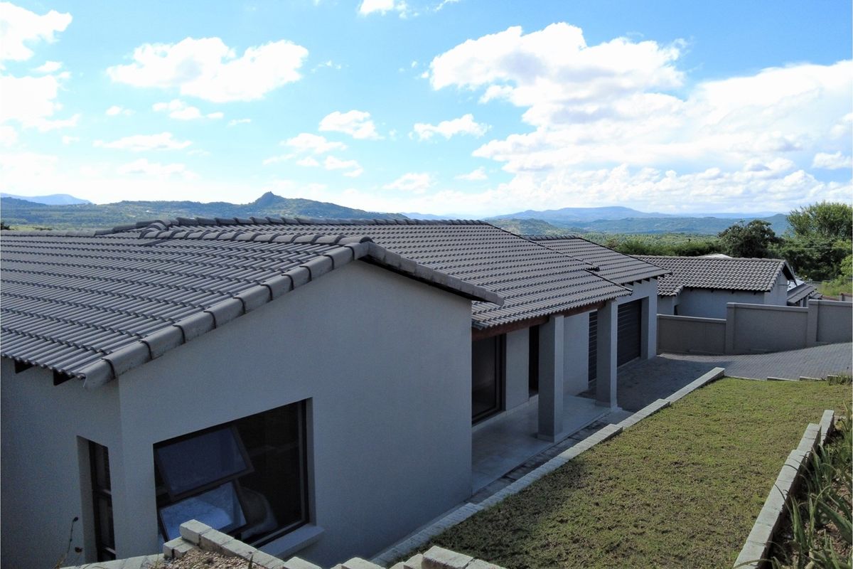 Elegant 3-Bedroom Home with Stunning Views in Secure Intaba Estate - Photo 4