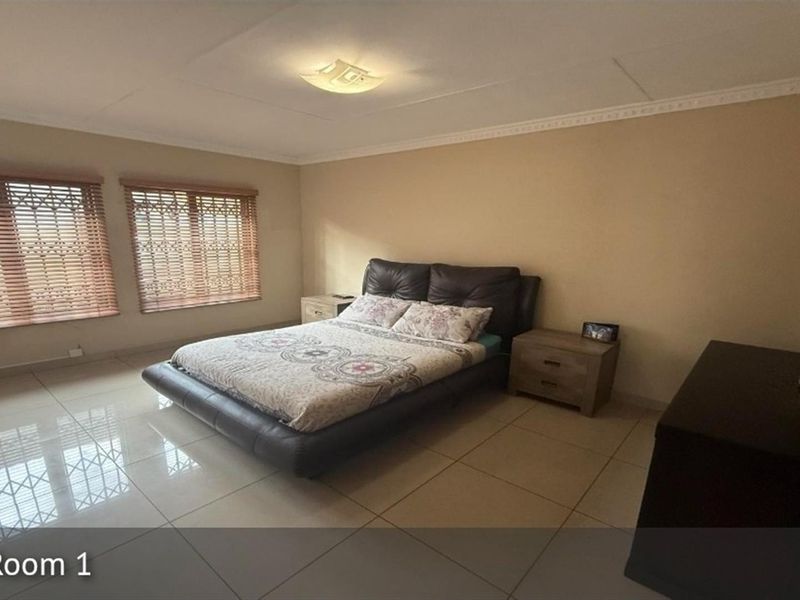 Neat 3-Bedroom Family Home with Double Garage in Secure Area Secunda - Photo 7
