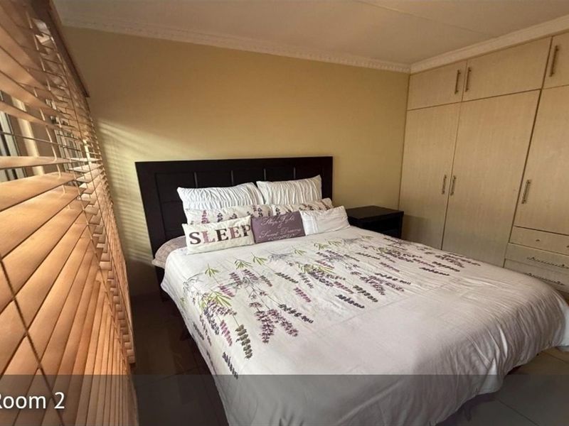 Neat 3-Bedroom Family Home with Double Garage in Secure Area Secunda - Photo 8