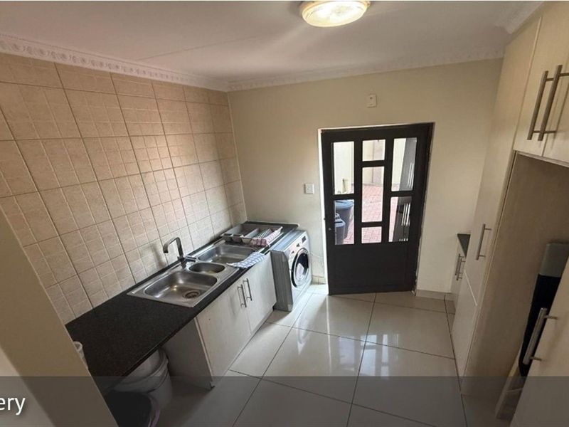 Neat 3-Bedroom Family Home with Double Garage in Secure Area Secunda - Photo 4