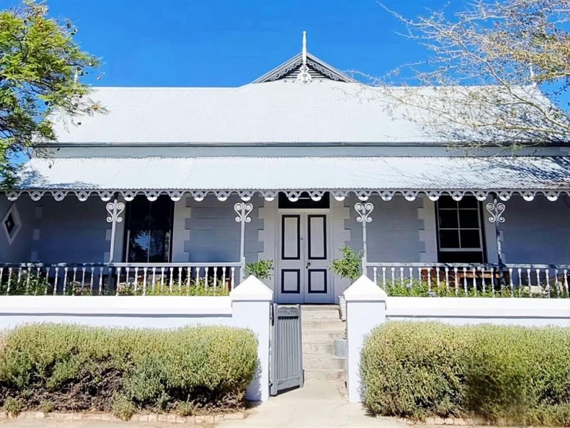 Timeless Victorian Elegance with Lush Gardens and Income-Generating Cottage - Photo 1