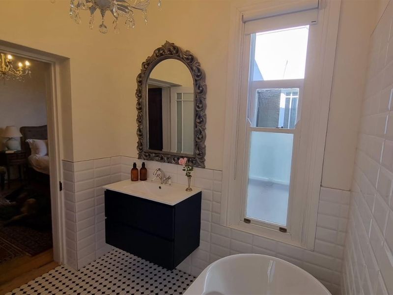 Timeless Victorian Elegance with Lush Gardens and Income-Generating Cottage - Photo 10