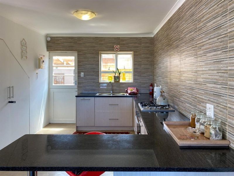 Versatile Dual-Living Beach Home | Corner Stand with Greenbelt Views | Walk to Silversands Beach - Photo 9