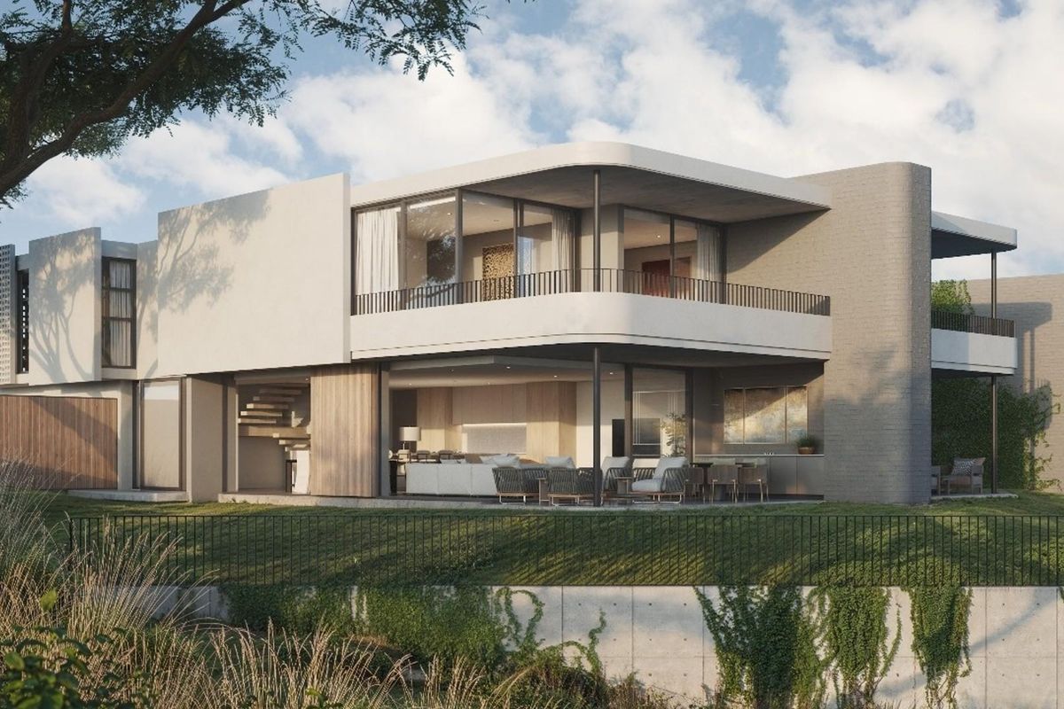 A modern architectural exterior view of a luxury multi-level residence featuring expansive glass sliding doors, a covered patio, and a sleek contemporary design.