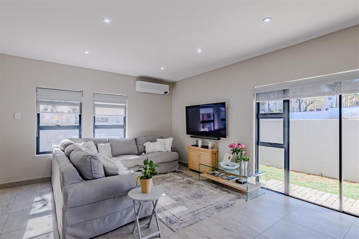 Modern and Energy-Efficient Home in Secure Estate! - Photo 3