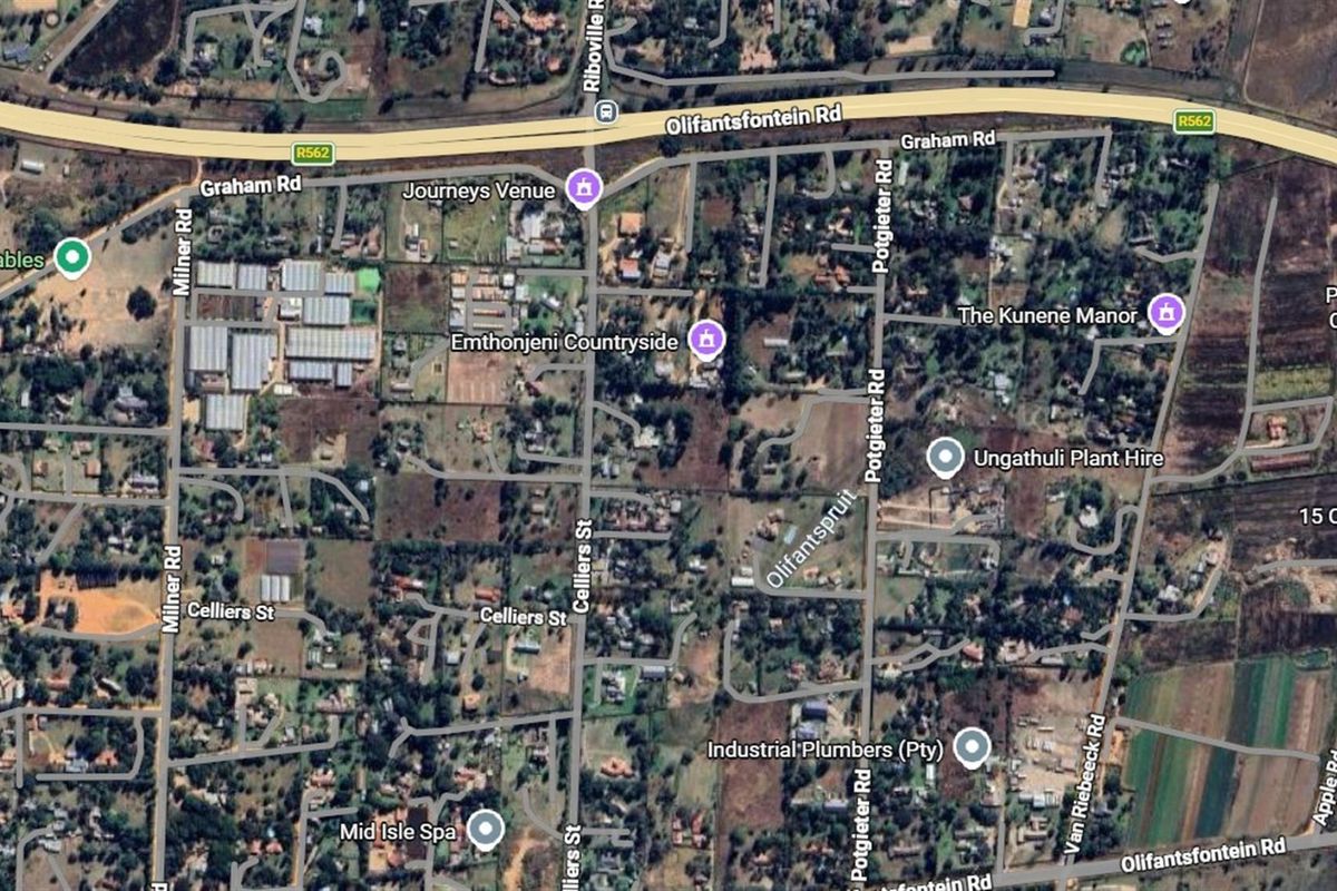 An aerial view of the surrounding area and road network, providing context for the property location.