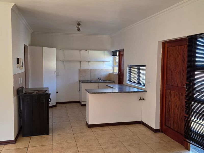 Well-Located 2-Bedroom Home in a Gated Complex - Photo 9