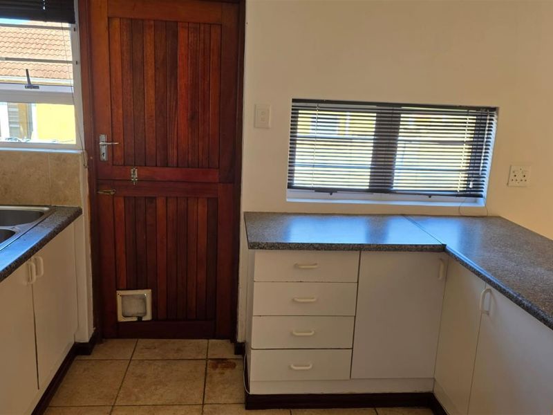 Well-Located 2-Bedroom Home in a Gated Complex - Photo 10